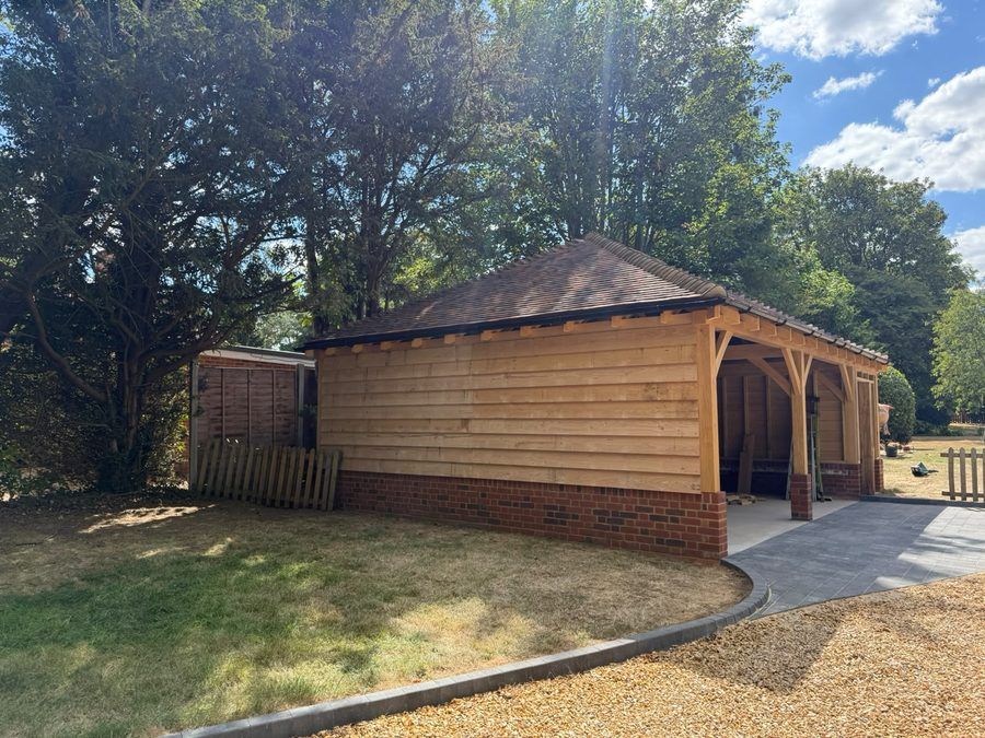 Completed oak-framed carport with clay tile roof, Knebworth